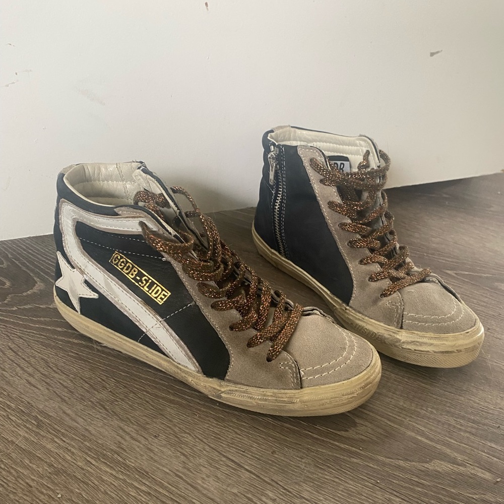 Golden goose high top sneakers.